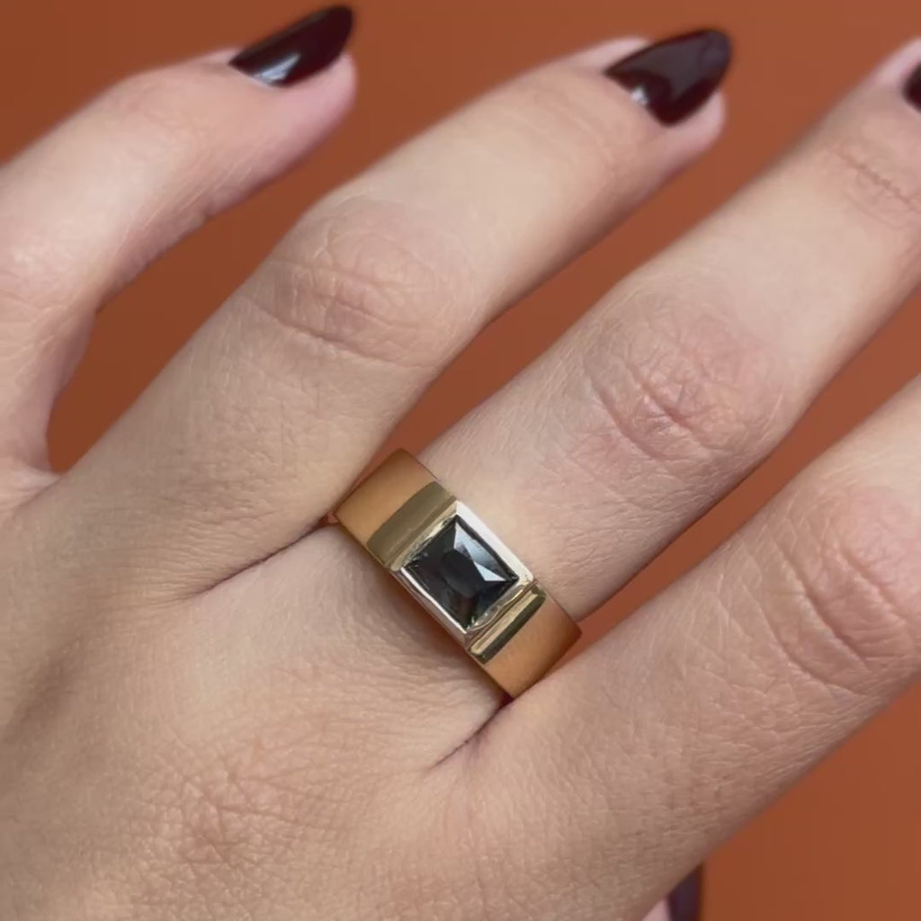 Model wears Kingsland Ring Rectangle Cut Sapphire 1.61ct by Goldpoint Jewelry on middle finger showing different angles on an orange backdrop