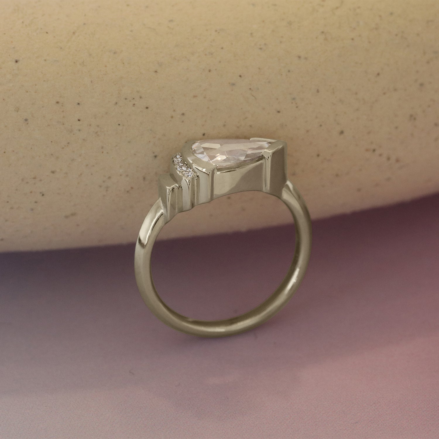 Alternate lifestyle side profile view of Kent Ring Pear Lab Diamond 0.62ct by Goldpoint
