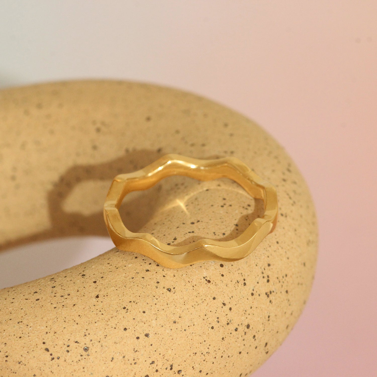 Lifestyle angled view of Waves Band in 14k Yellow Gold