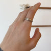 Model moving hand showcasing Cornice Band / Five Tiers on index finger
