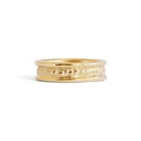 Front view of Ruins Band Polished Sides in 14k yellow gold