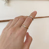 Model wears You & Me Dome Band Two-Tone / Large and You & Me Dome Band Two-Tone / Small on index finger